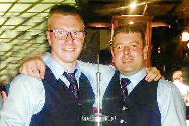 Piping pair help band to world victory