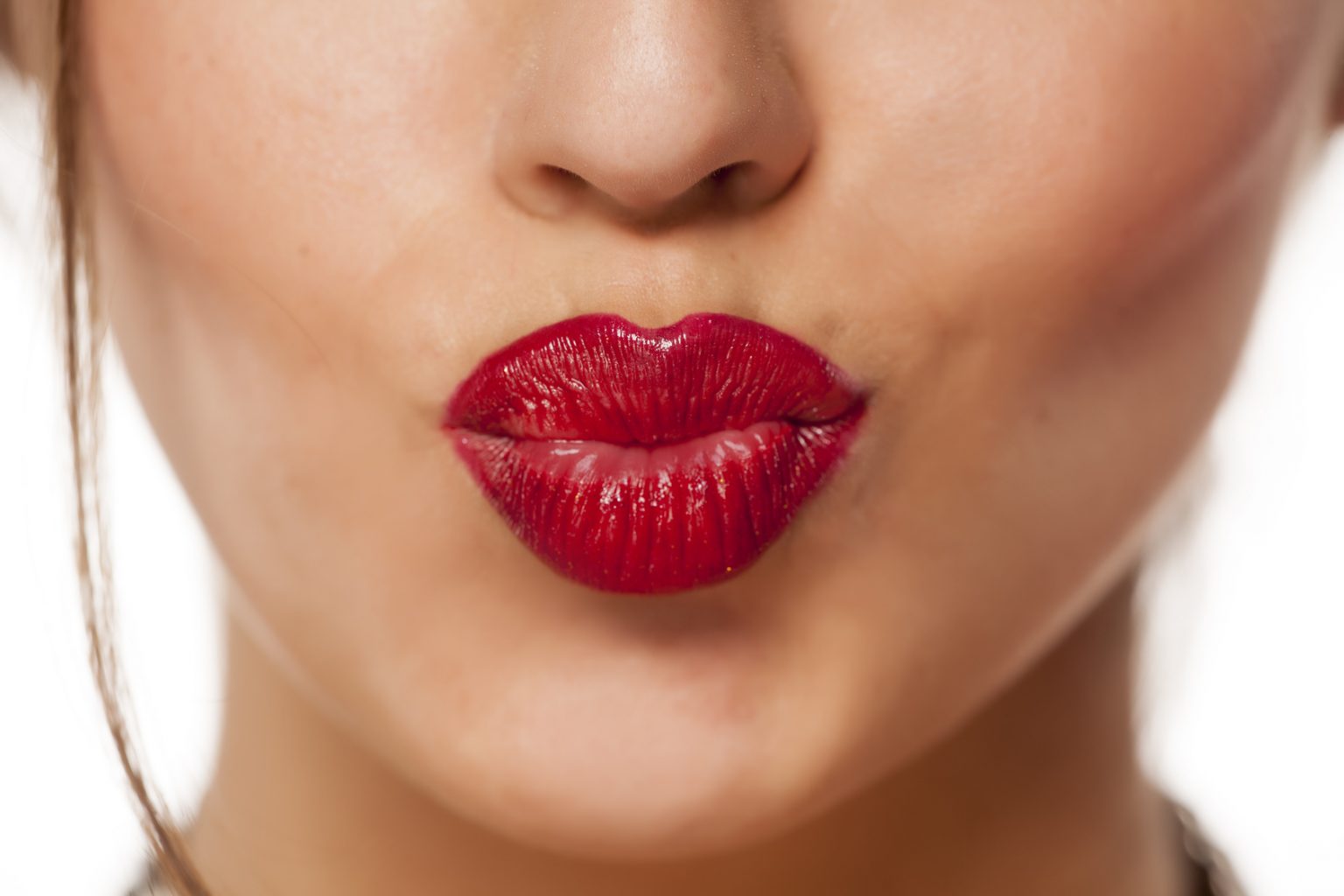 female pursed mouth with red lipstick DNG Online Limited