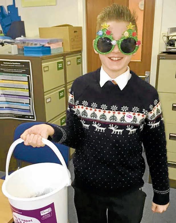 CHRISTMAS JUMPER DAY . . . loving brother Ethan Turnbull raising money for Clic Sargent