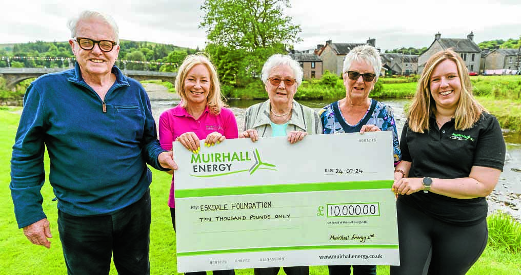 Foundation team welcome windfarm donation