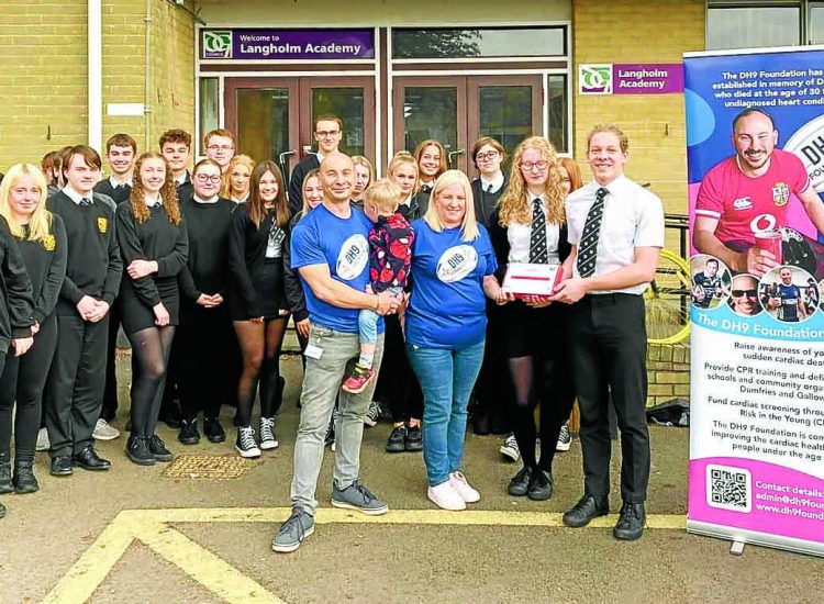 Charity gifts defib to schools