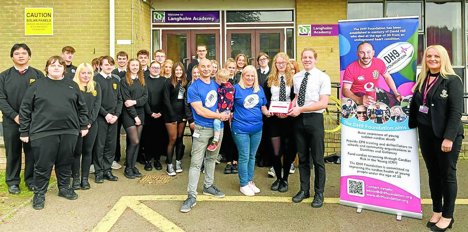 Charity gifts defib to schools