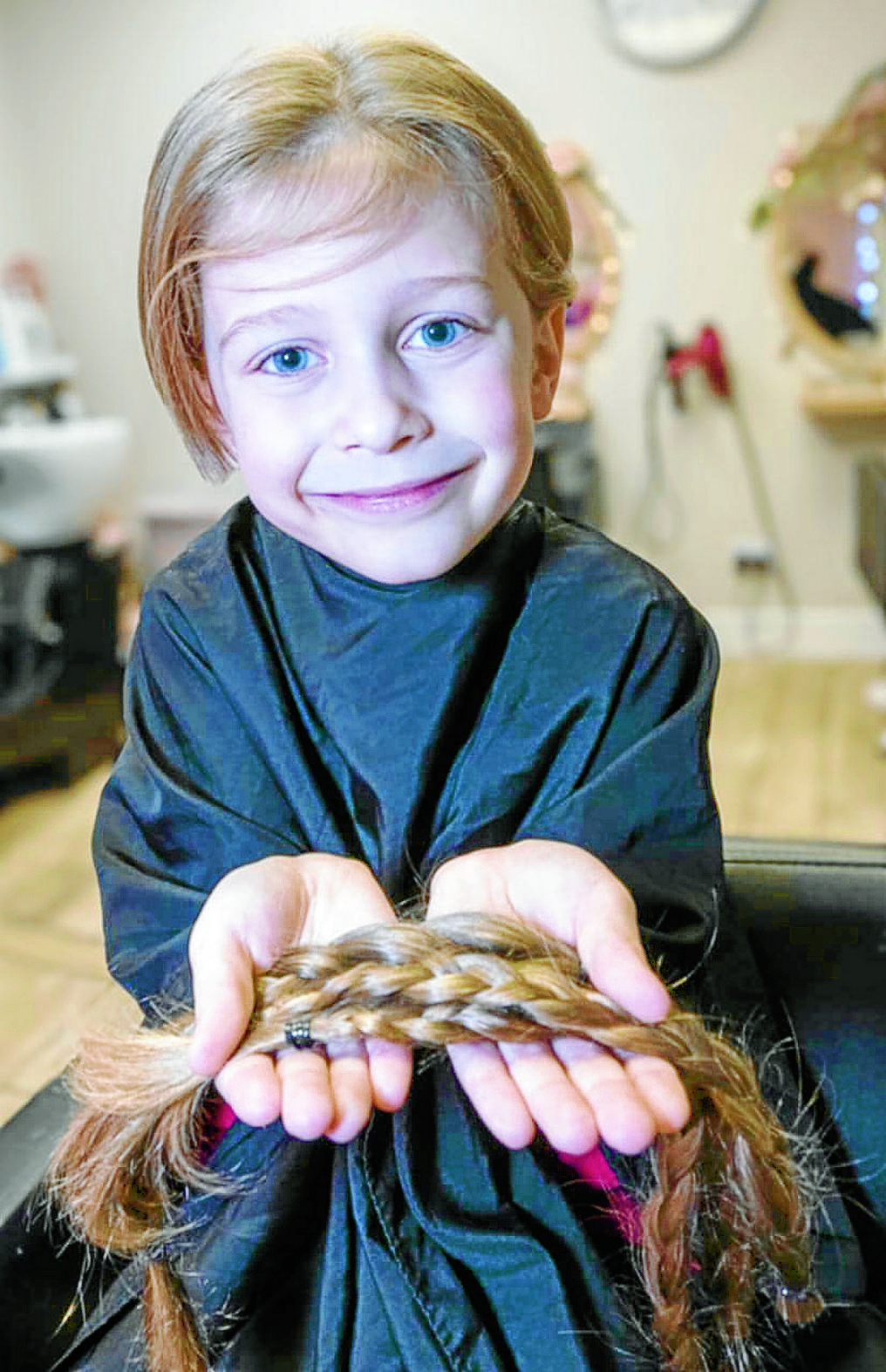 Kind-hearted Logan in charity hair chop