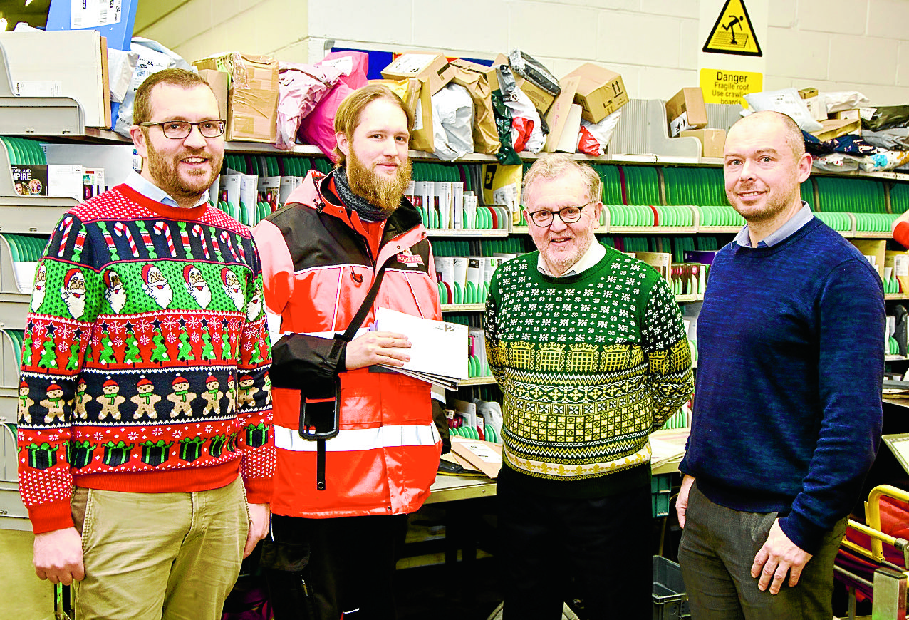 Delivering festive cheer to busy posties