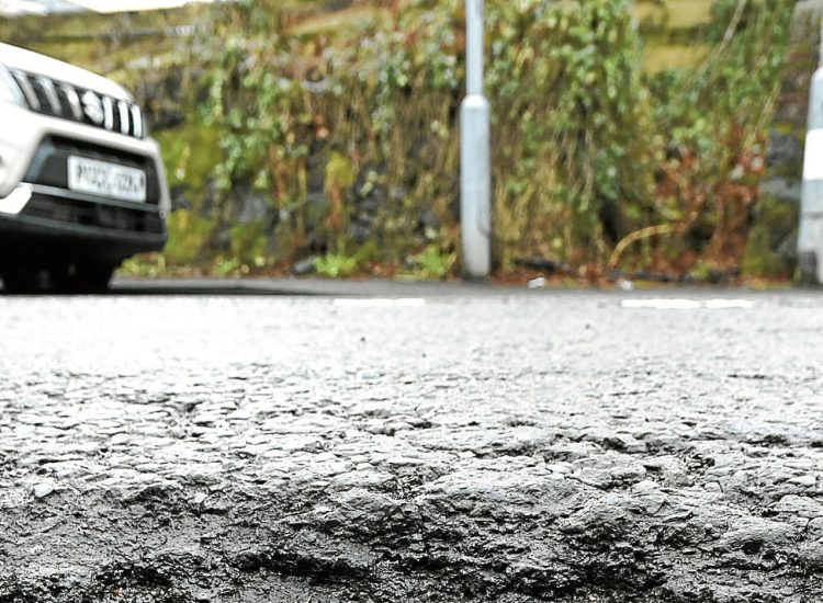 Neighbours live in fear of pothole